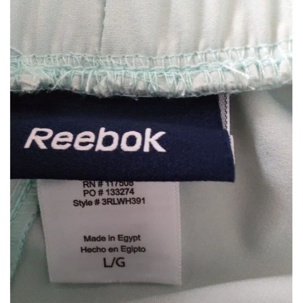 New with tags Women's Reebok Gym Workout Athletic Light Blue Shorts Size L / G